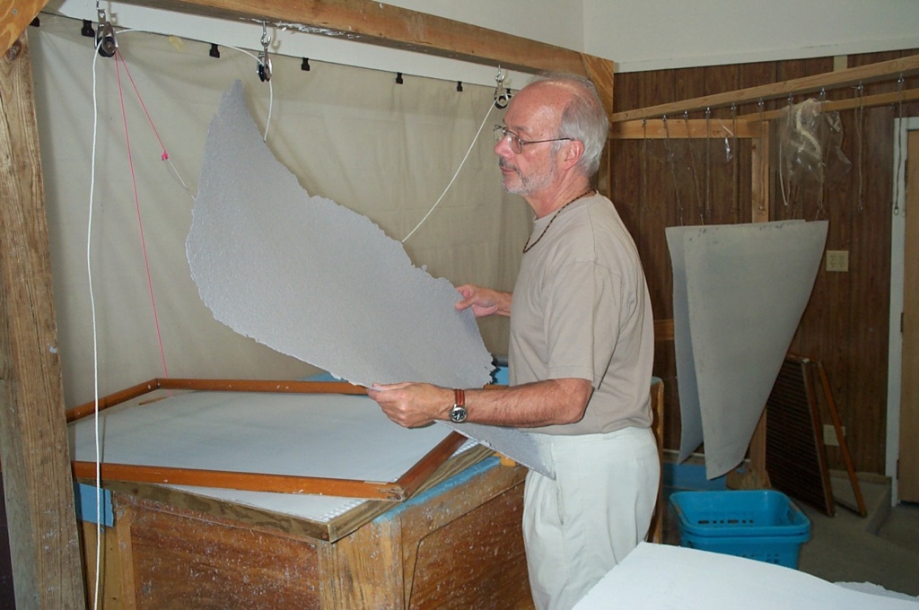 Laurence Barker making paper